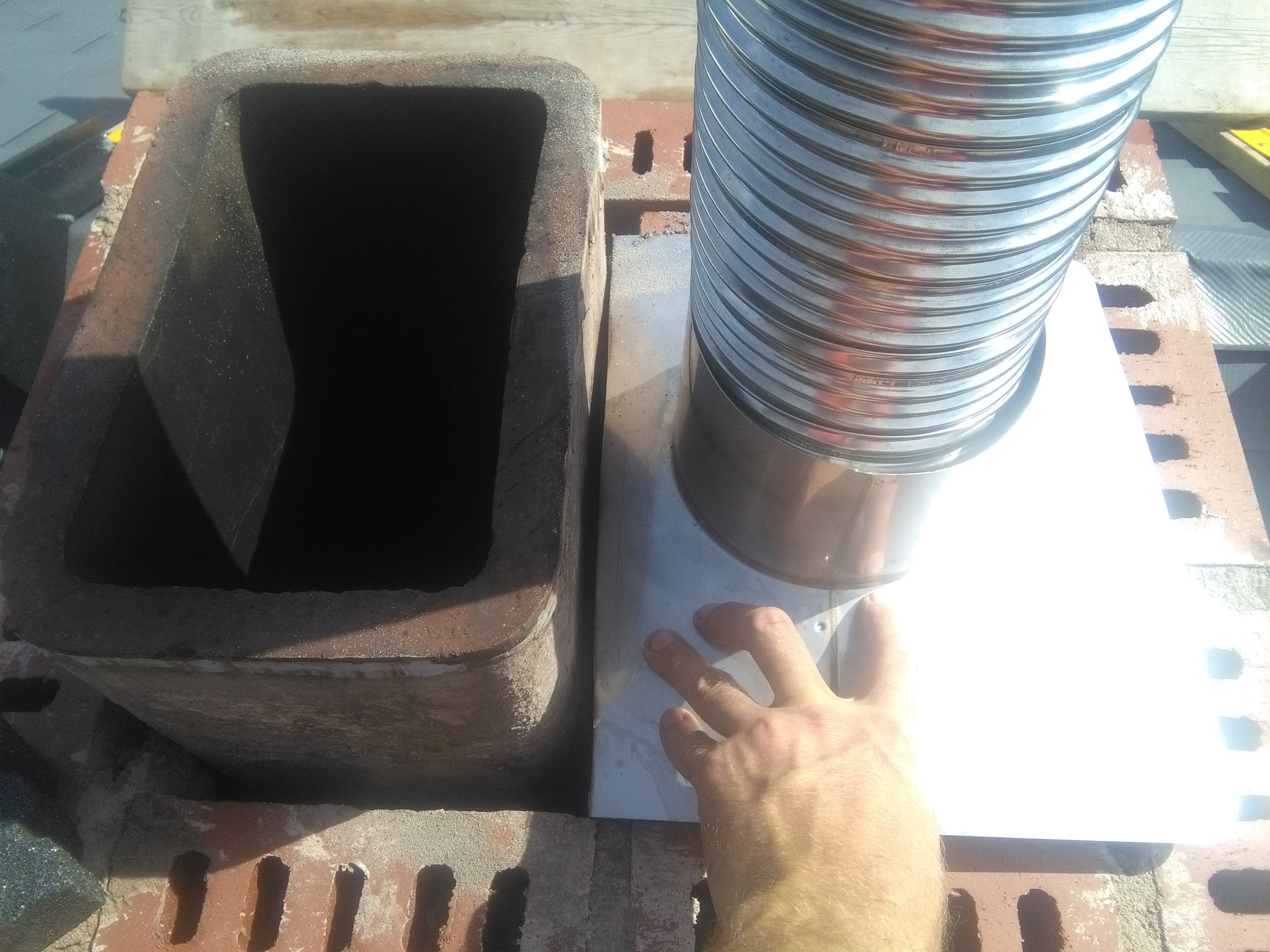 image of chimney liner installation services completed in Halifax-Dartmouth Regional Municipality by Pro Chimney Services based in Halifax, NS servicing all of the Halifax-Dartmouth Regional Municipality, Bedford, Sackville, Mount Uniacke, Windsor, Hantsport , Wolfville, Kentville, Chester, Mahone Bay, Lunenburg, Bridgewater, Liverpool, Fall River, Wellington, Enfield, Elmsdale, Brookfield, Truro, Musquodoboit Harbour & surrounding areas.