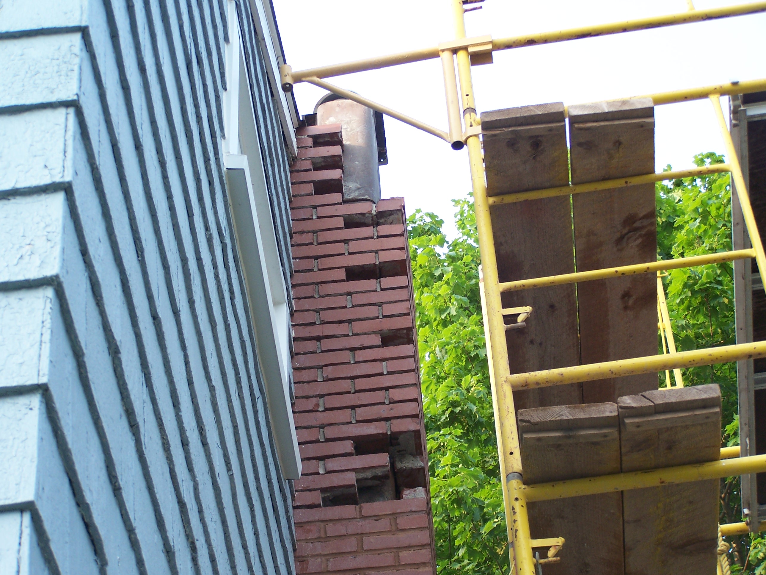 image of chimney-chimney repair services completed in Windsor, NS by Pro Chimney Services based in Halifax, NS servicing all of the Halifax-Dartmouth Regional Municipality, Bedford, Sackville, Mount Uniacke, Windsor, Hantsport , Wolfville, Kentville, Chester, Mahone Bay, Lunenburg, Bridgewater, Liverpool, Fall River, Wellington, Enfield, Elmsdale, Brookfield, Truro, Musquodoboit Harbour & surrounding areas.