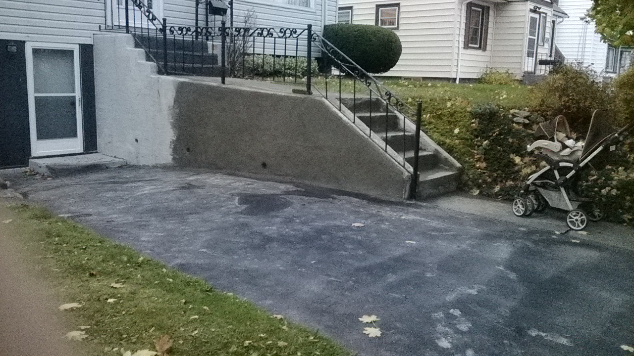 image of concrete retaining wall-concrete retaining wall repairs completed in Windsor, NS by Pro Chimney Services based in Halifax, NS is providing their concrete foundation repair services to all of the Halifax-Dartmouth Regional Municipality, Bedford, Sackville, Mount Uniacke, Hantsport, Windsor, Wolfville, Kentville, Chester Basin, Mahone Bay, Lunenburg, Bridgewater, Liverpool, Fall River, Wellington, Enfield, Elmsdale, Brookfield, Truro, Musquodoboit Harbour & surrounding areas.